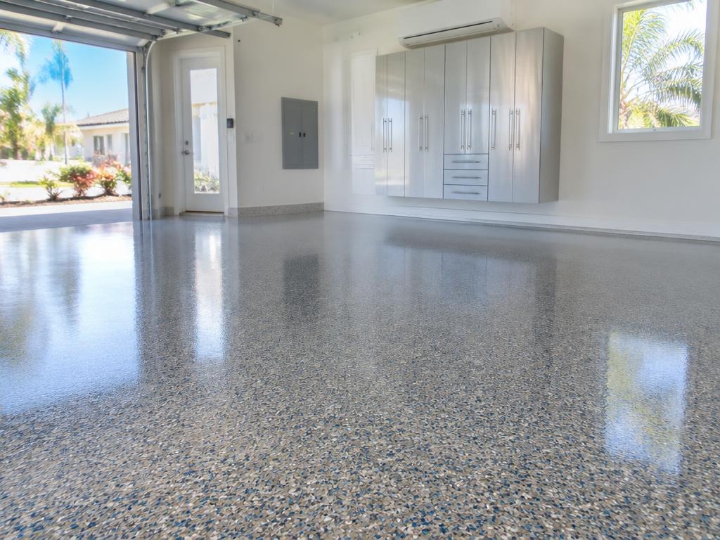 Glossy flake epoxy garage floor with decorative chips